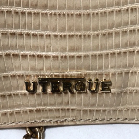 Uterque snake embossed leather clutch with chain strap